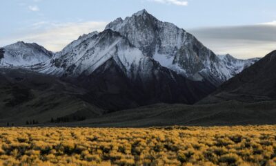 High altitude mountain peaks above the clouds